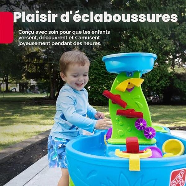 Découvrez la table d'eau Step2 rain shower : une table de jeu extérieure avec 13 accessoires inclus pour des heures de divertissement aquatique en famille. 